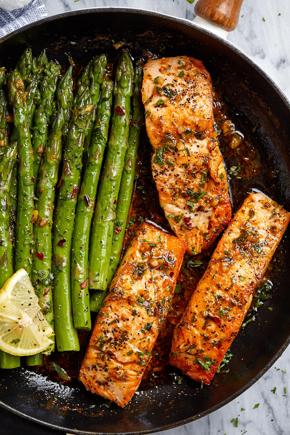 Garlic Butter Salmon with Lemon Asparagus Skillet
