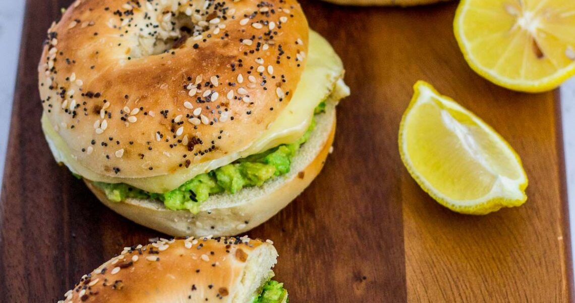 Avocado bagel breakfast sandwich with fried egg - My Eclectic Bites